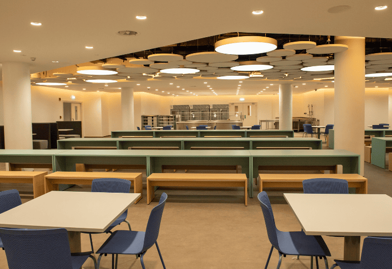 Modern Collaborative Dining Interior Collaborative dining space featuring modern interior design by Design and Build Co.